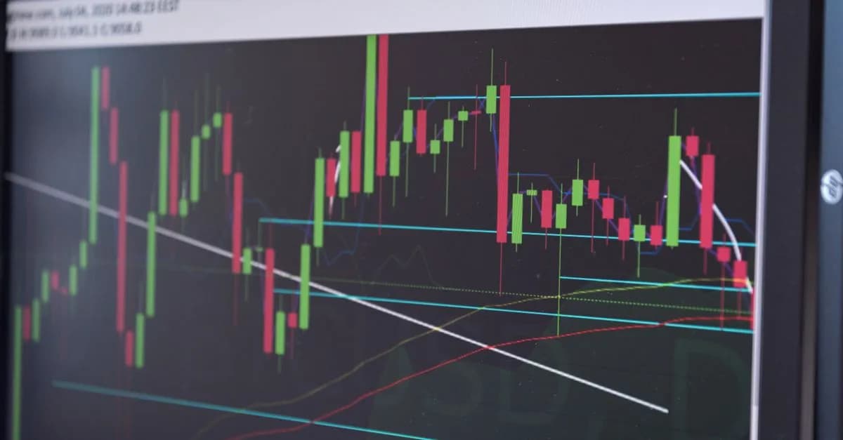A close-up view of a cryptocurrency trading chart displayed on a monitor, showcasing market trends.